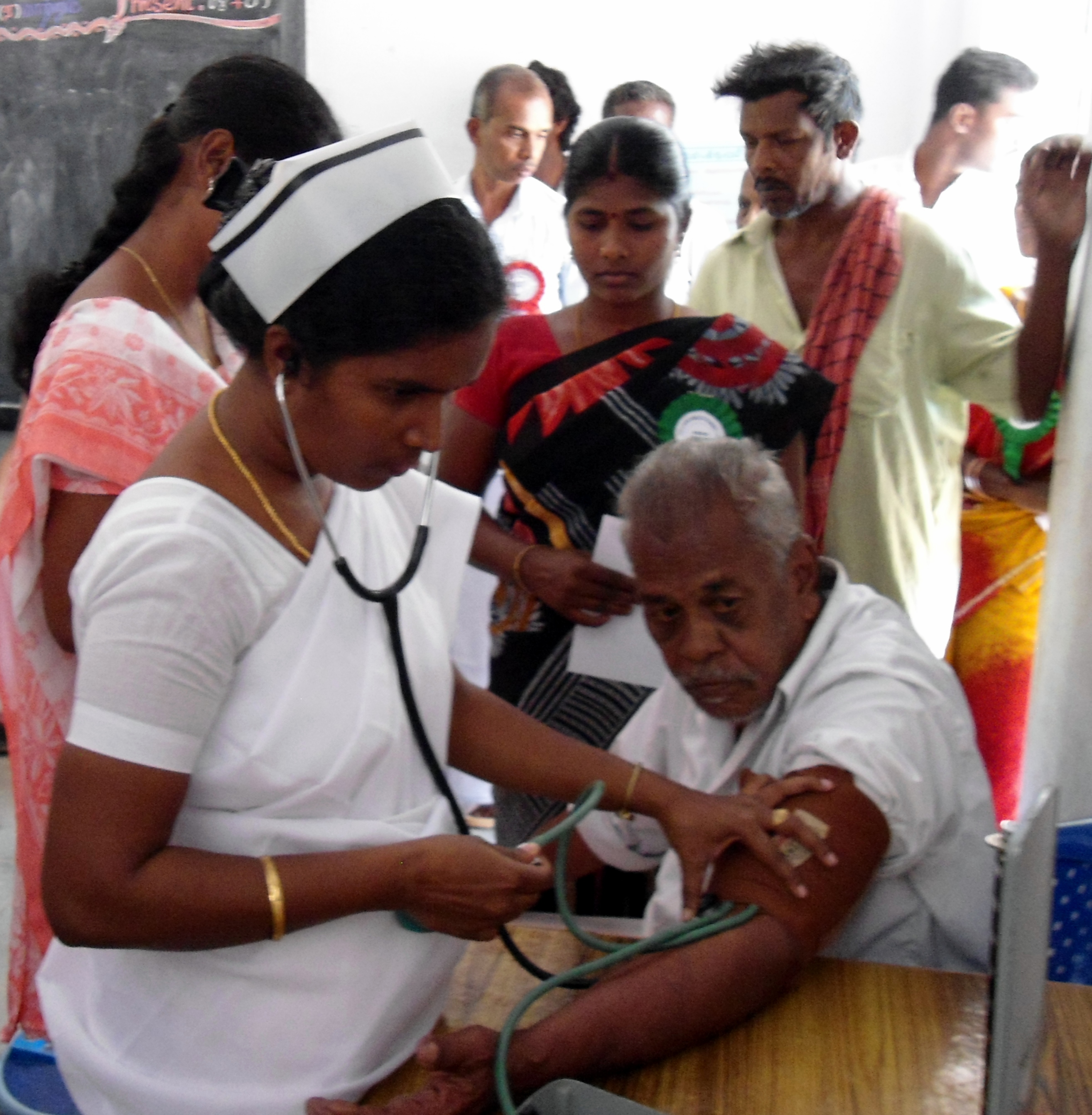 Villagers receiving health check